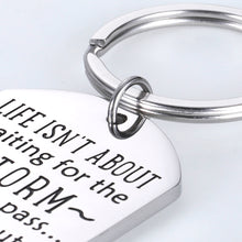 Load image into Gallery viewer, Encouragement Gifts for Daughter Son Motivational Keychain Inspirational Birthday Graduation Gift for Women Men Teenage Girls Boys Life Isn’t About Waiting The Storm Jewelry Charm